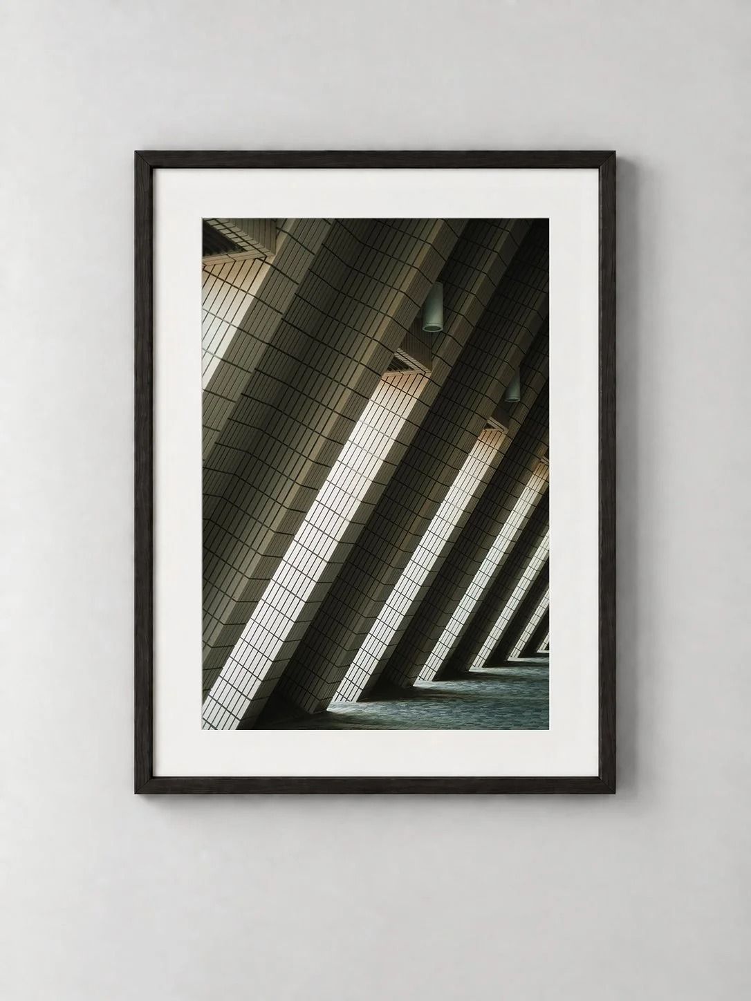 Arch.1, shown framed on a wall